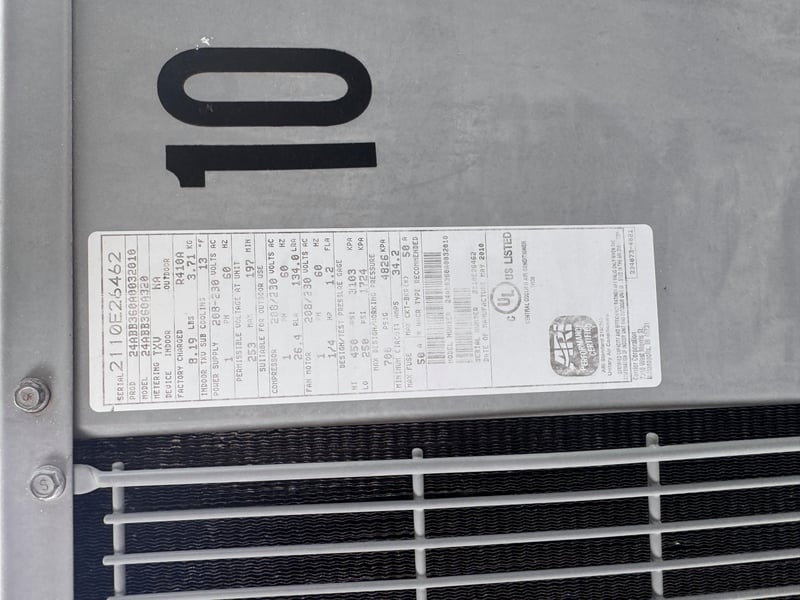 Condenser unit numbered 10 with nameplate at 11700 New Kings Rd, Jacksonville, FL 32219