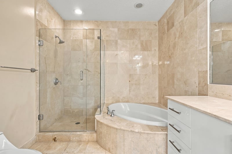 Bathroom with soaking tub and glass shower, photographed by Megapixeler on Riverplace Blvd, Jacksonville