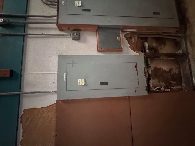 Open electrical panel with exposed wiring at 11700 New Kings Rd, Jacksonville, FL 32219