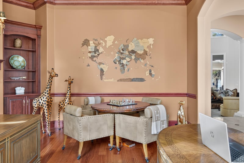 Room with safari-theme decor and world map wall art at 344 Broward Rd, Jacksonville, FL