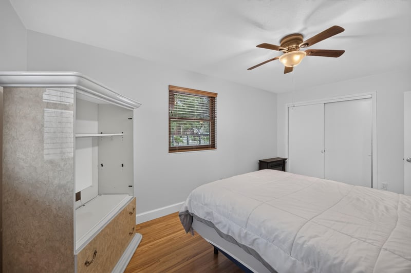 Bedroom with closet and window at 1847 Grove Park Dr, Orange Park, FL