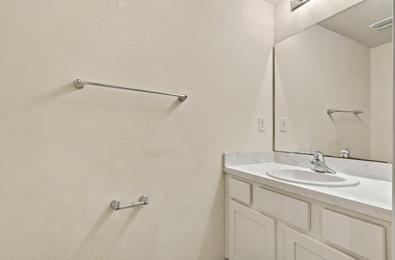 Bathroom vanity with mirror and towel bar at 9555 Star Dr, Jacksonville, FL 32256