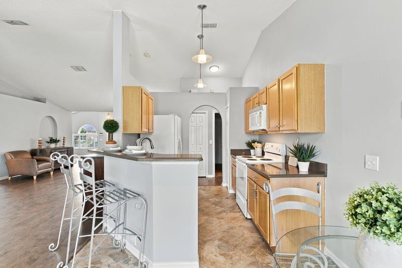 Kitchen island with tile flooring at 11197 Illford Dr