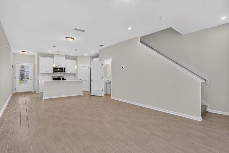 Kitchen and stairwell at 39 Mellowood Ln, St. Augustine, FL 32092