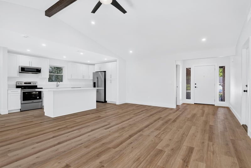 Kitchen with stainless range and open entry view at 8453 Boysenberry Ln W, Jacksonville, FL