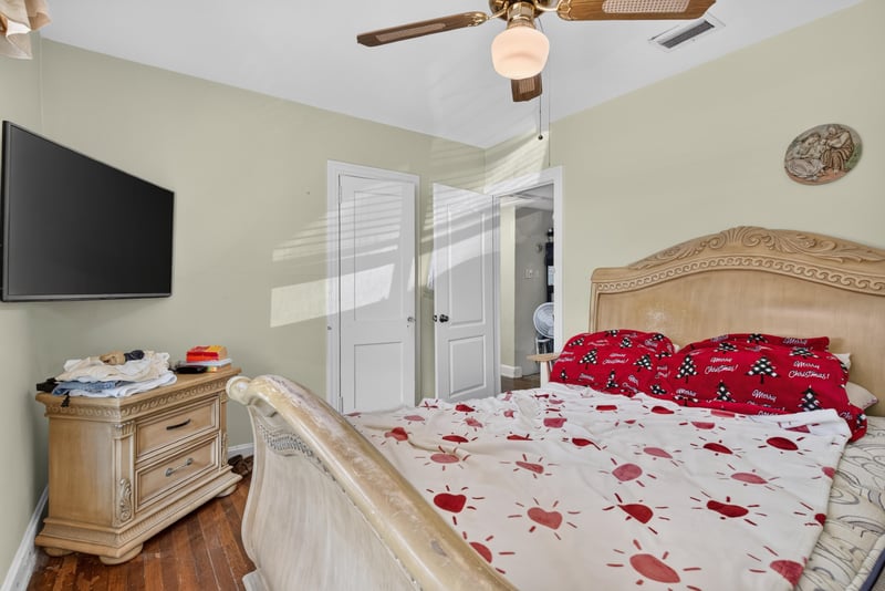 Bedroom with bed and ceiling fan at 5745 110th St, Jacksonville, FL 32244