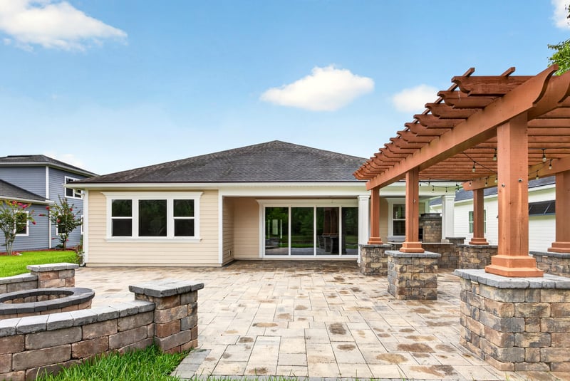 Back exterior with pergola and patio at 186 Freshwater Dr