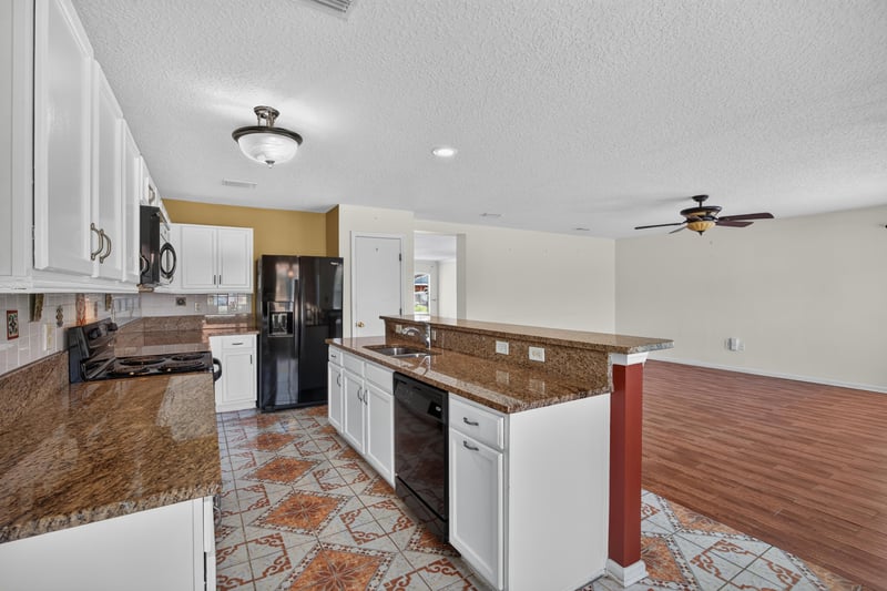 Kitchen view toward family room at 2282 Justin Lake Dr, Jacksonville, FL