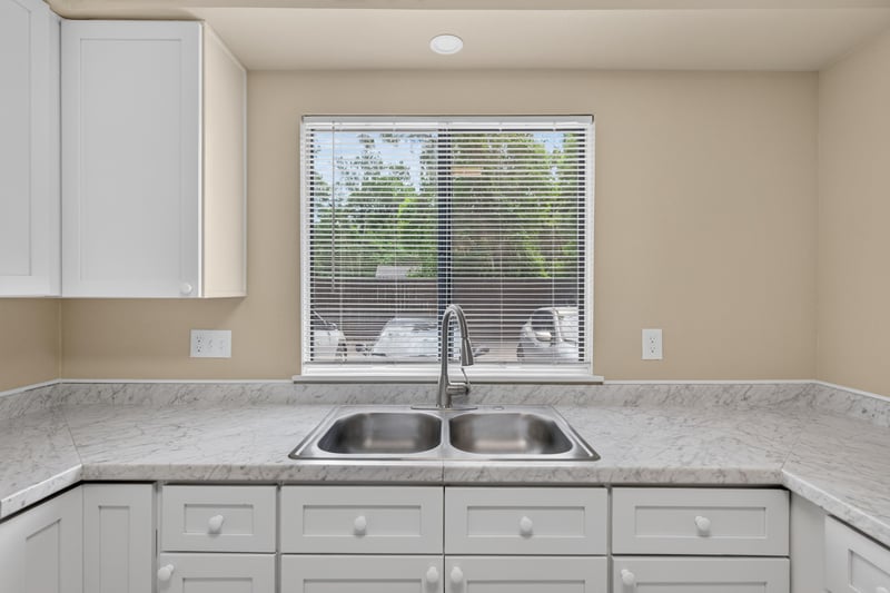 Kitchen sink with parking lot view at 5811 Atlantic Blvd unit 47, Jacksonville, FL 32207