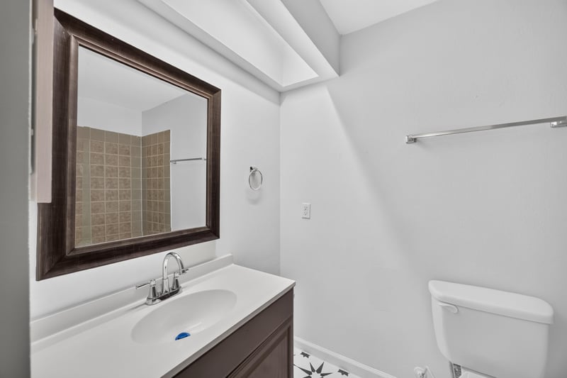 Bathroom vanity with mirror at 3801 Crown Point Rd unit 2061, Jacksonville, FL 32257