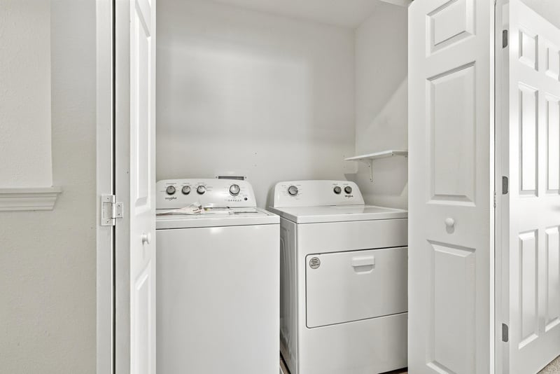 Laundry closet with washer and dryer at 8359 Zenith Cir, Jacksonville, FL 32256