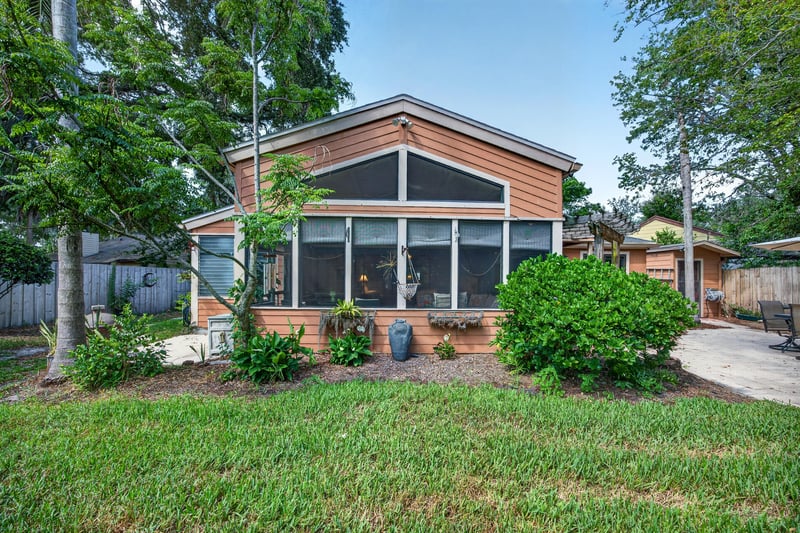 Rear exterior with sunroom addition at 4837 Pareja Ct, Jacksonville, FL 32225