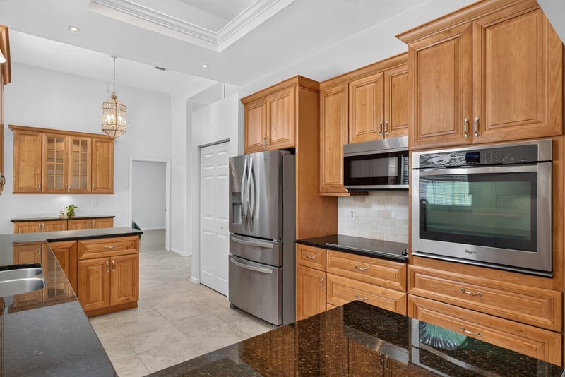Kitchen wall ovens and cabinets at 12810 Swamp Owl Ln