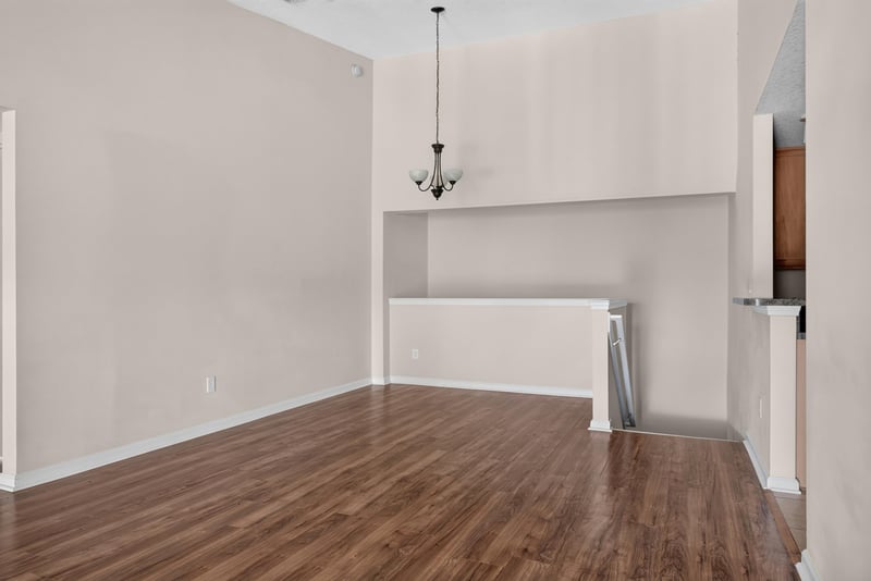 Dining area open to kitchen pass-through at 7047 Deer Lodge Cir, Jacksonville