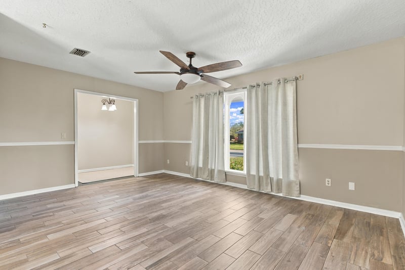 Living room interior view with natural light, photographed by Megapixeler on Crosby Ln, Orange Park