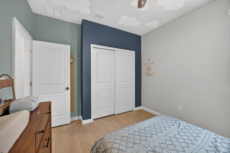 Secondary bedroom closet doors at 93 Lochloosa Ct, St. Johns, FL 32259
