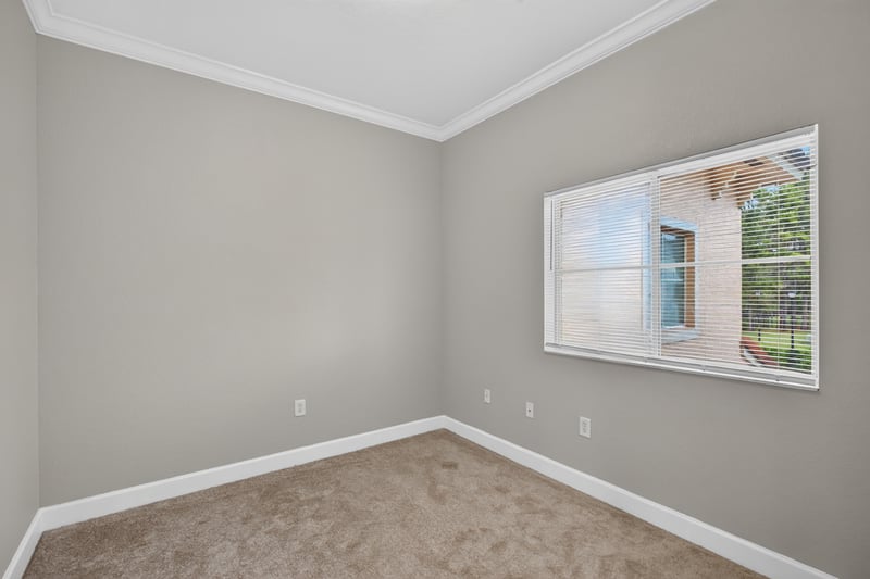 Carpeted entry room with window at 9745 Touchton Rd, Jacksonville, FL 32246