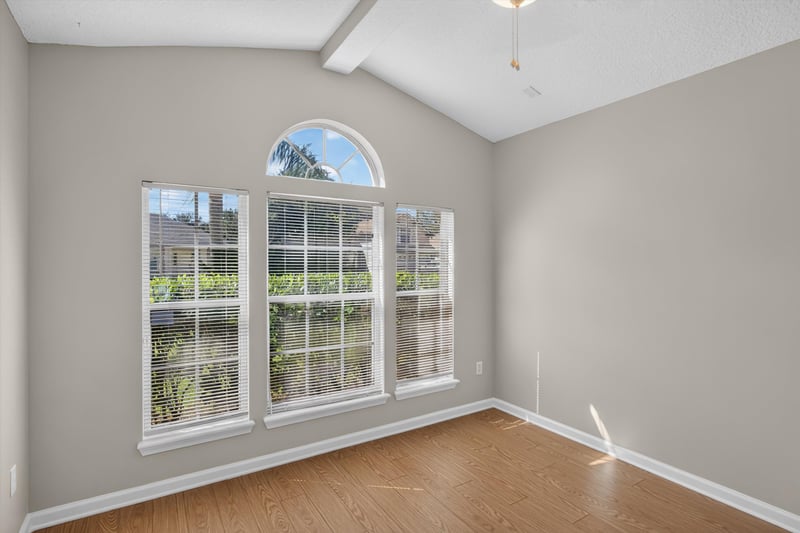 Empty room with arched window at 14147 Fish Eagle Dr E, Jacksonville, FL 32226