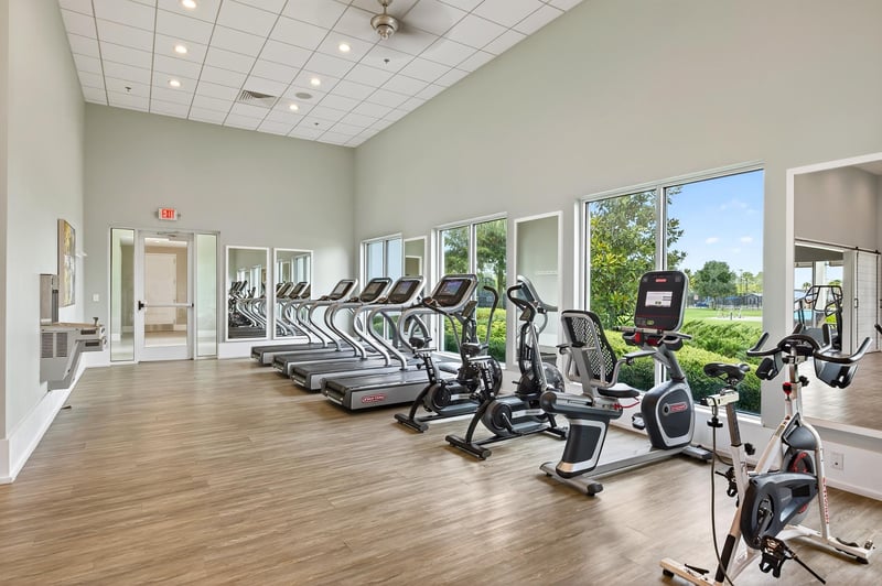 Fitness center with treadmills and bikes in Beachwalk, St. Johns, FL