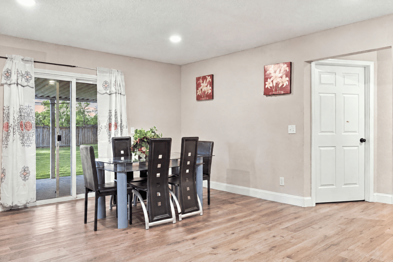 Dining area with sliding glass door to backyard at 357 Dillon Dr, Orange Park, FL