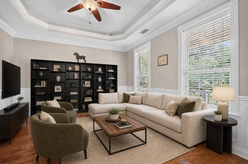 Living room staged with sectional sofa and built-in shelving at 1735 Hagans Ridge Ct