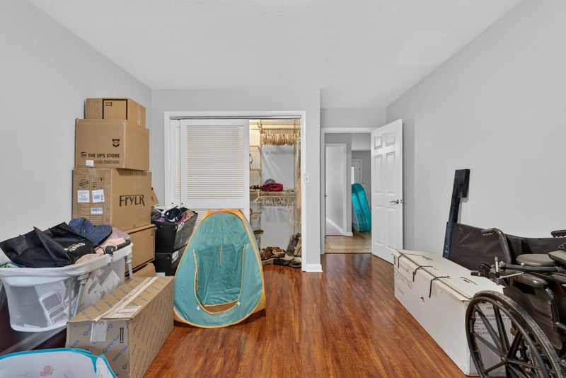 Room with closet and storage boxes at 5745 110th St, Jacksonville, FL 32244