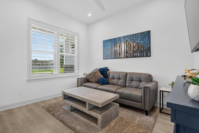 Living room with large windows and natural light at 785 Back Creek Dr, St. Augustine, FL 32092