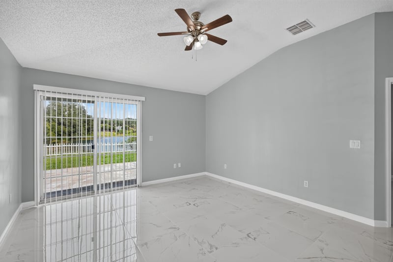 Living room with window view toward water at 490 Hillside Dr, Orange Park, FL 32073