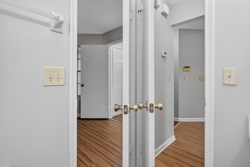 Hallway with closet doors at 8010 International Village Dr, Jacksonville, FL 32277