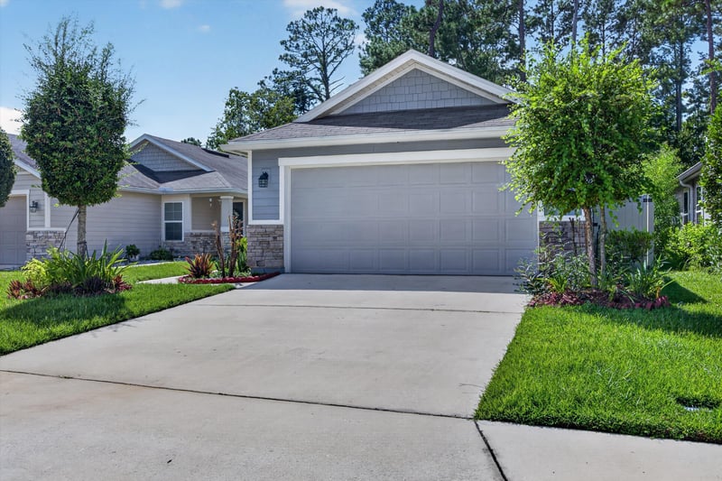 Front exterior garage and driveway at 7118 Preston Pnes Trl, Jacksonville, FL