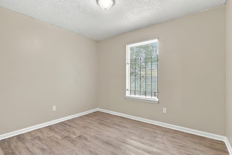 Empty bedroom with single window at 219 Shortreed St, Jacksonville, FL 32254