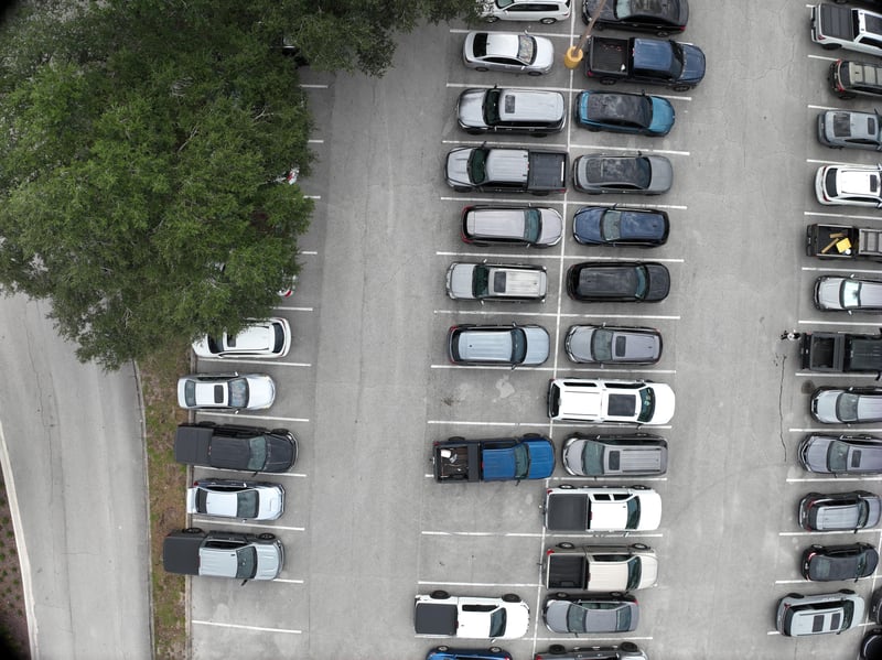 Aerial view of parking lot and tree canopy at 9406 Atlantic Blvd, Jacksonville, FL 32225