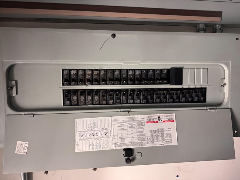 Open breaker panel with directory label at 11700 New Kings Rd, Jacksonville, FL 32219