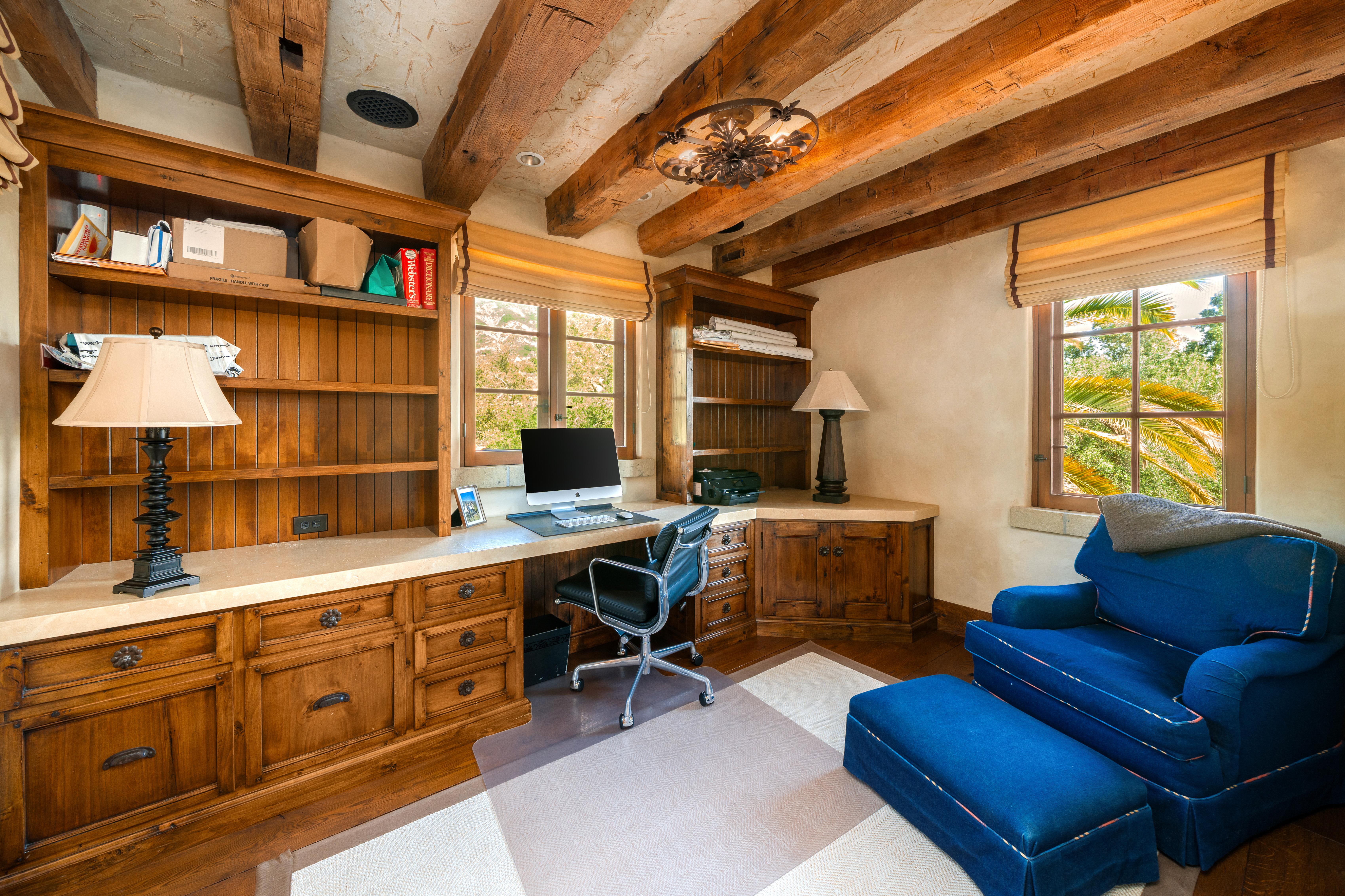 Professional real estate photography of grand interior living spaces at 1915 Monte Alegre Dr, Carpinteria — warm natural light and architectural scale define this exceptional Carpinteria bluffs residence. Our team captured editorial photography, aerial drone photography via Inspire 3 Cinema Drone, a cinematic property video, a true vertical social media reel, and twilight photography from midday through twilight.