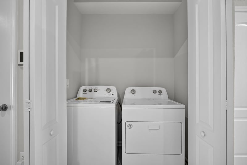 Laundry closet with washer and dryer at 2837 Black Buck Cir, Jacksonville, FL 32225