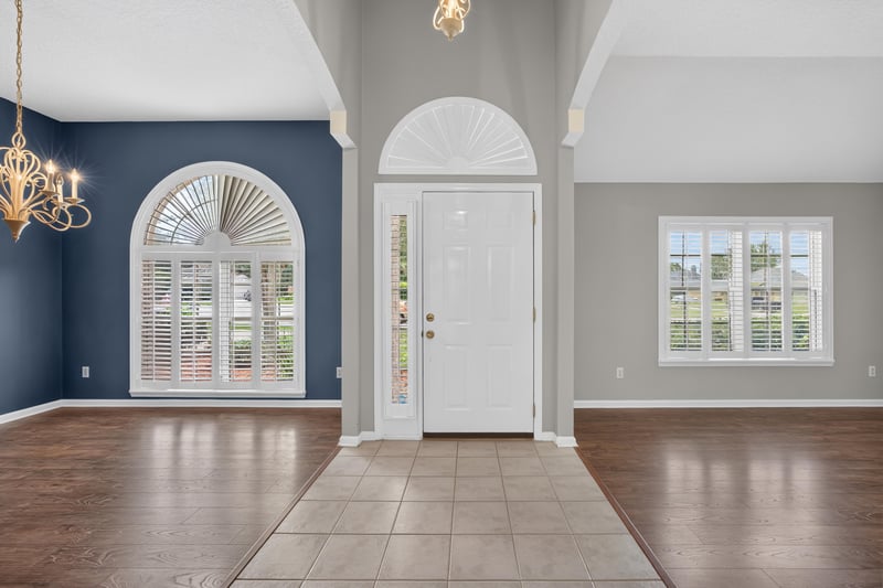 Foyer with tile floor and arched window at 1955 GUARDED Way, Fleming Island, FL 32003