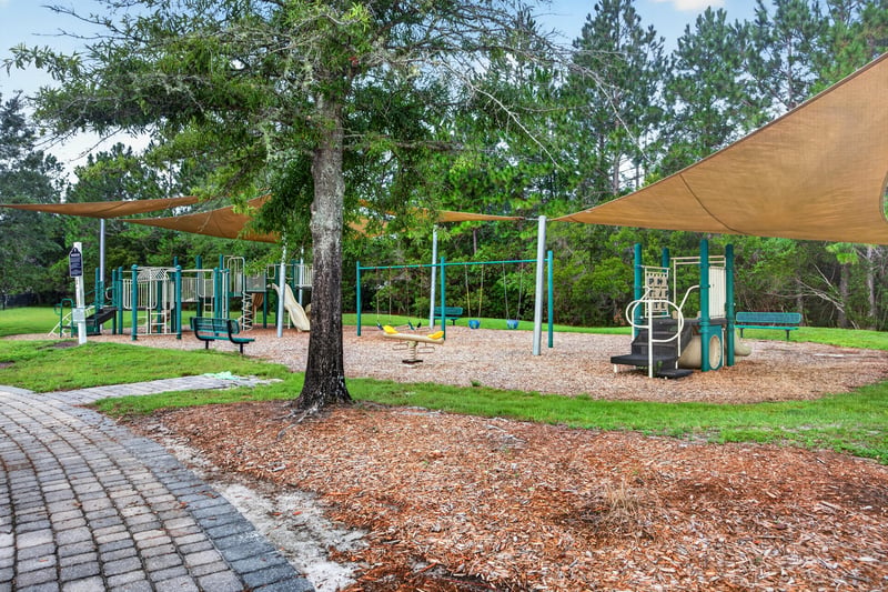 Playground with shade sails in River Glen