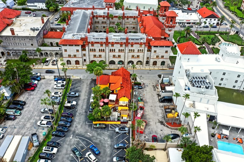 Aerial view of the property among downtown rooftops in St. Augustine, FL