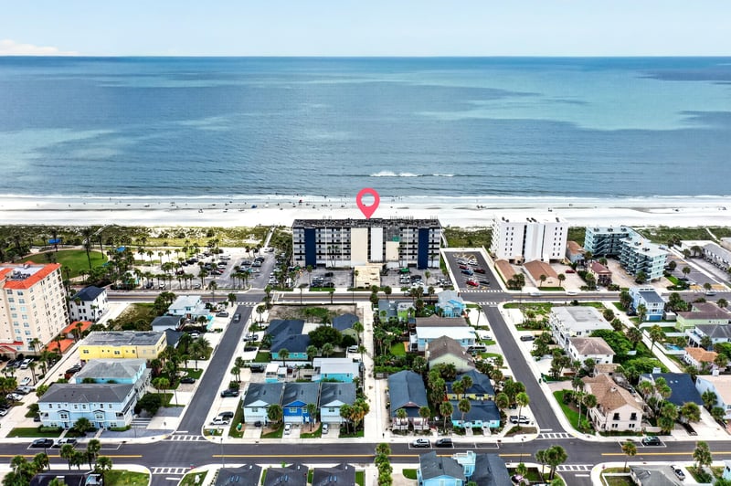 Aerial view of the building along the ocean and street at 601 1st St S, Jacksonville Beach