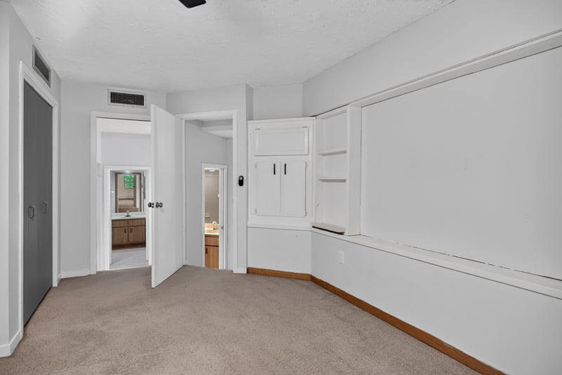 Hallway with built-in cabinetry at 2910 Ravines Rd, Middleburg, FL 32068