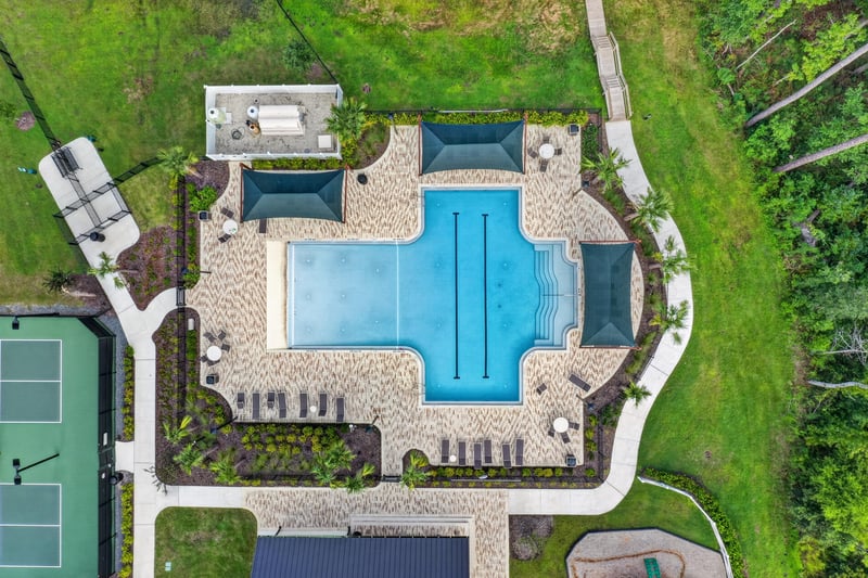 Aerial view of the cross-shaped community pool in Middleburg, FL