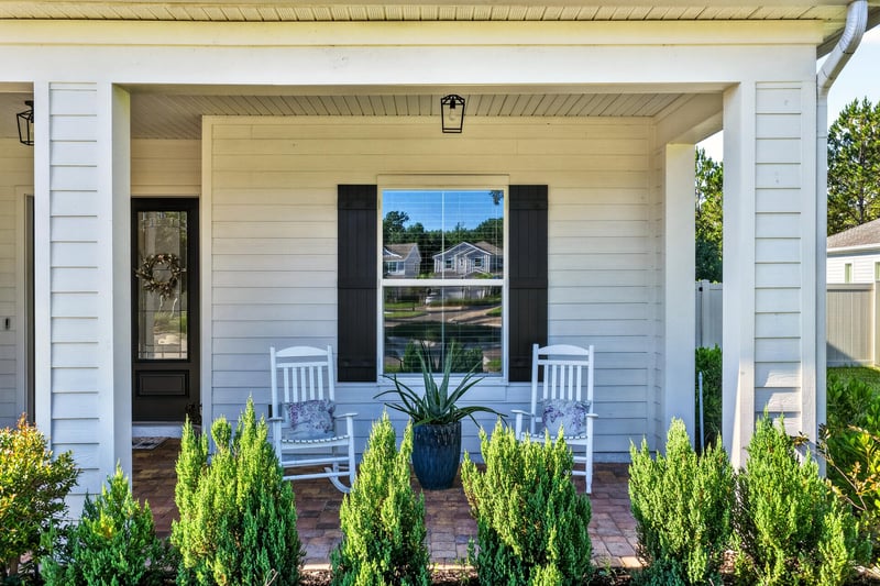 Front porch close view with black shutters at 22 Azura Point
