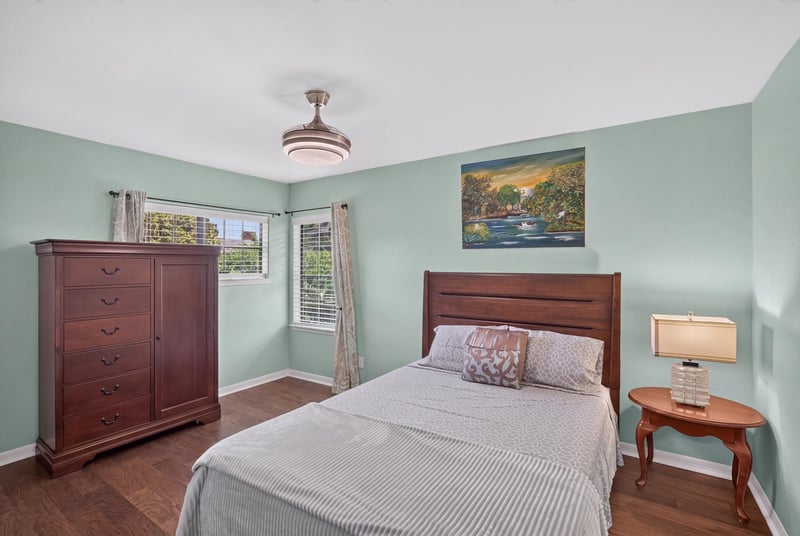 Bedroom with bed and window at 10150 Belle Rive Blvd, Jacksonville, FL