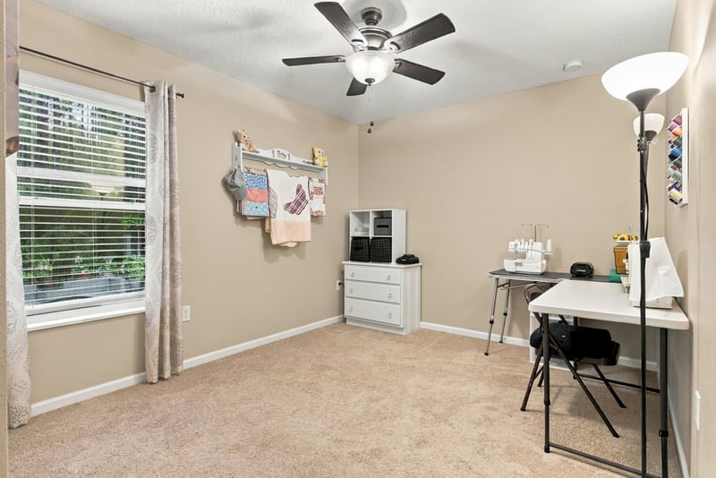 Flex room with closet doors and window at 10923 Black Diamond Ct, Jacksonville, FL