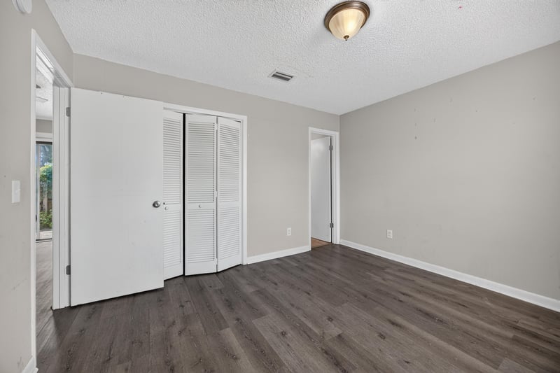 Hallway with closet doors at 2719 Trollie Ln