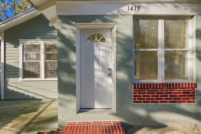 Twin front entry doors close-up, photographed by Megapixeler on W 24th St, Jacksonville