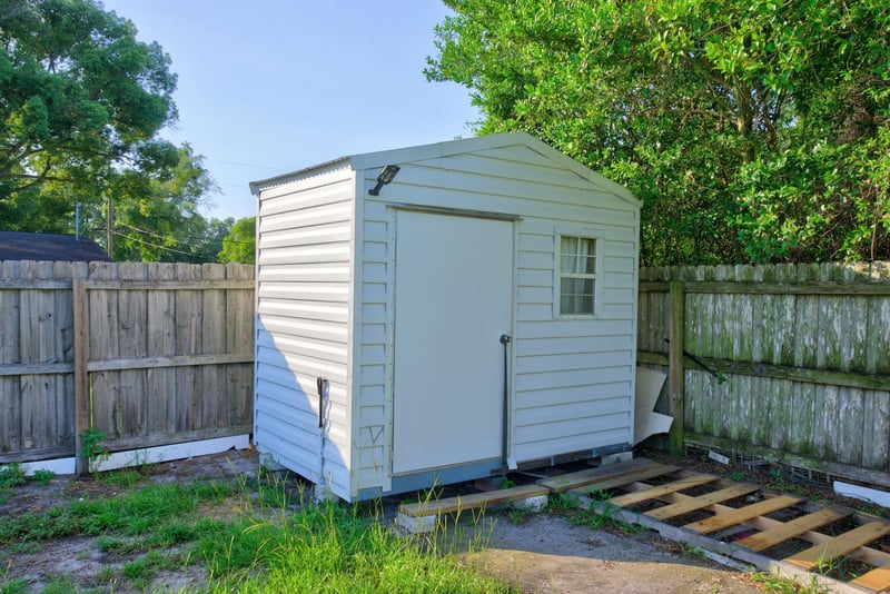 Storage shed in side yard at 442 Ameca Ave, Orange Park, FL 32073