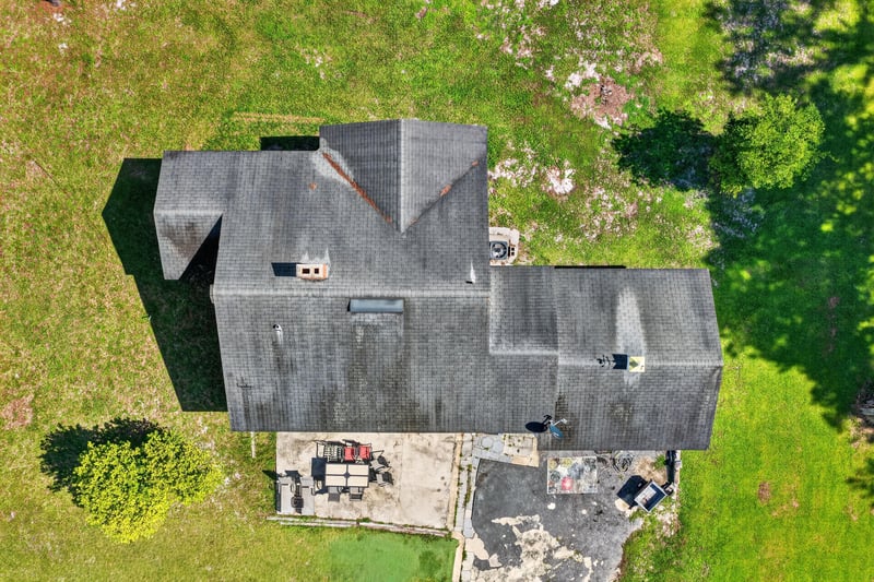 Aerial view of the home's roofline and side yard at 5745 110th St, Jacksonville, FL 32244