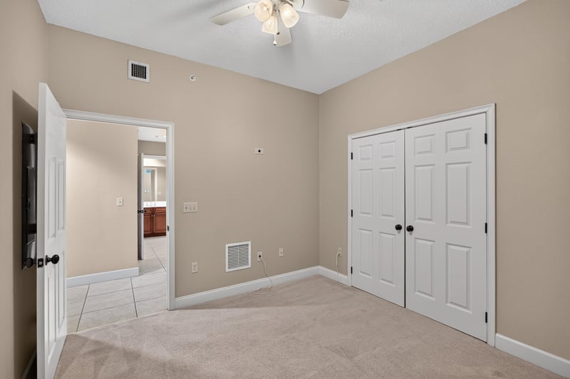 Bedroom closet with double doors at 1478 Riverplace Blvd 1904, Jacksonville, FL 32207