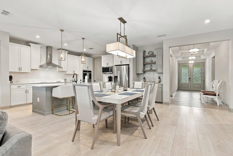 Dining area table with view toward the foyer at 3921 Spyglass Hill Ln